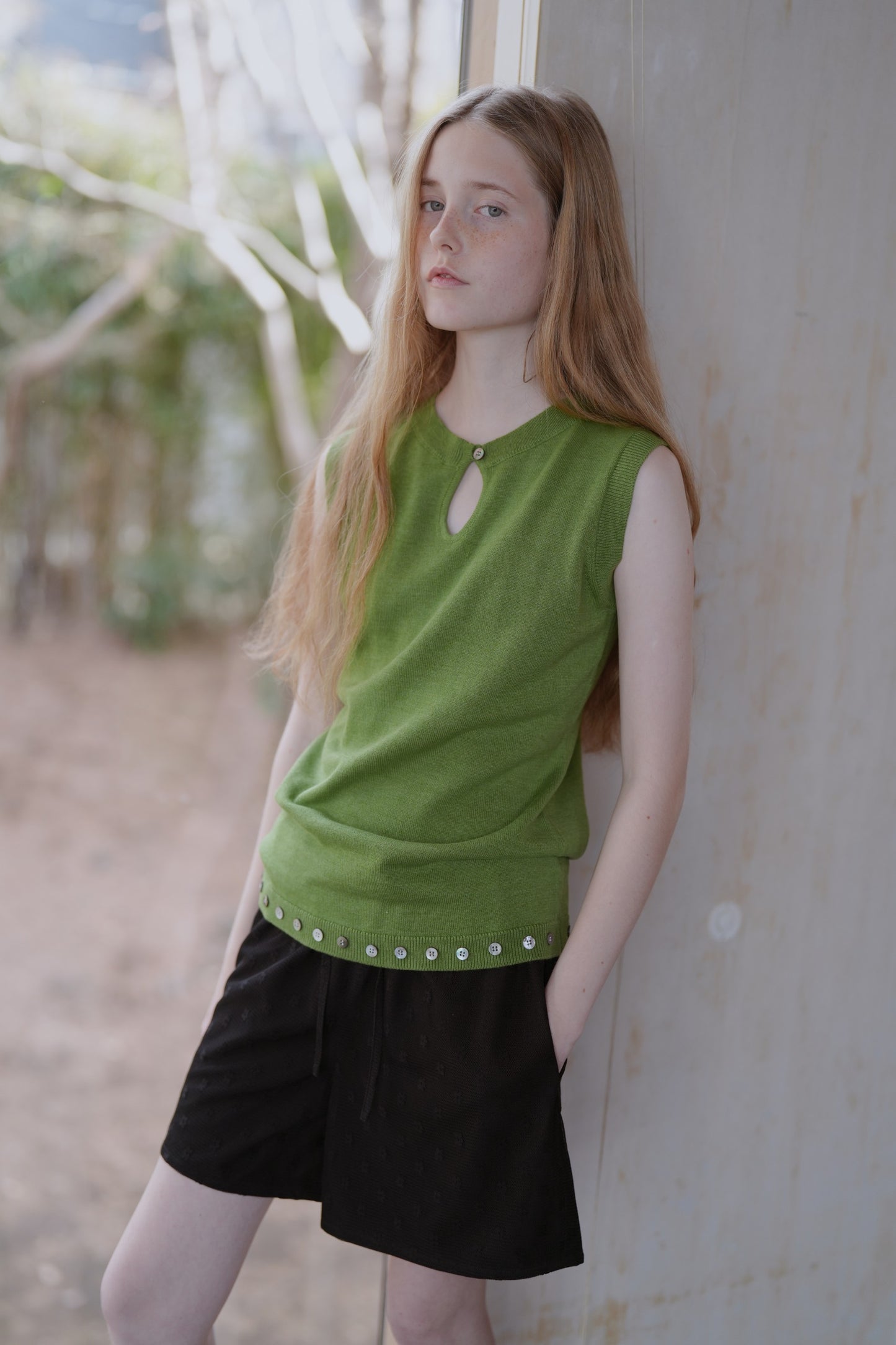 Hem button knit top / Basil