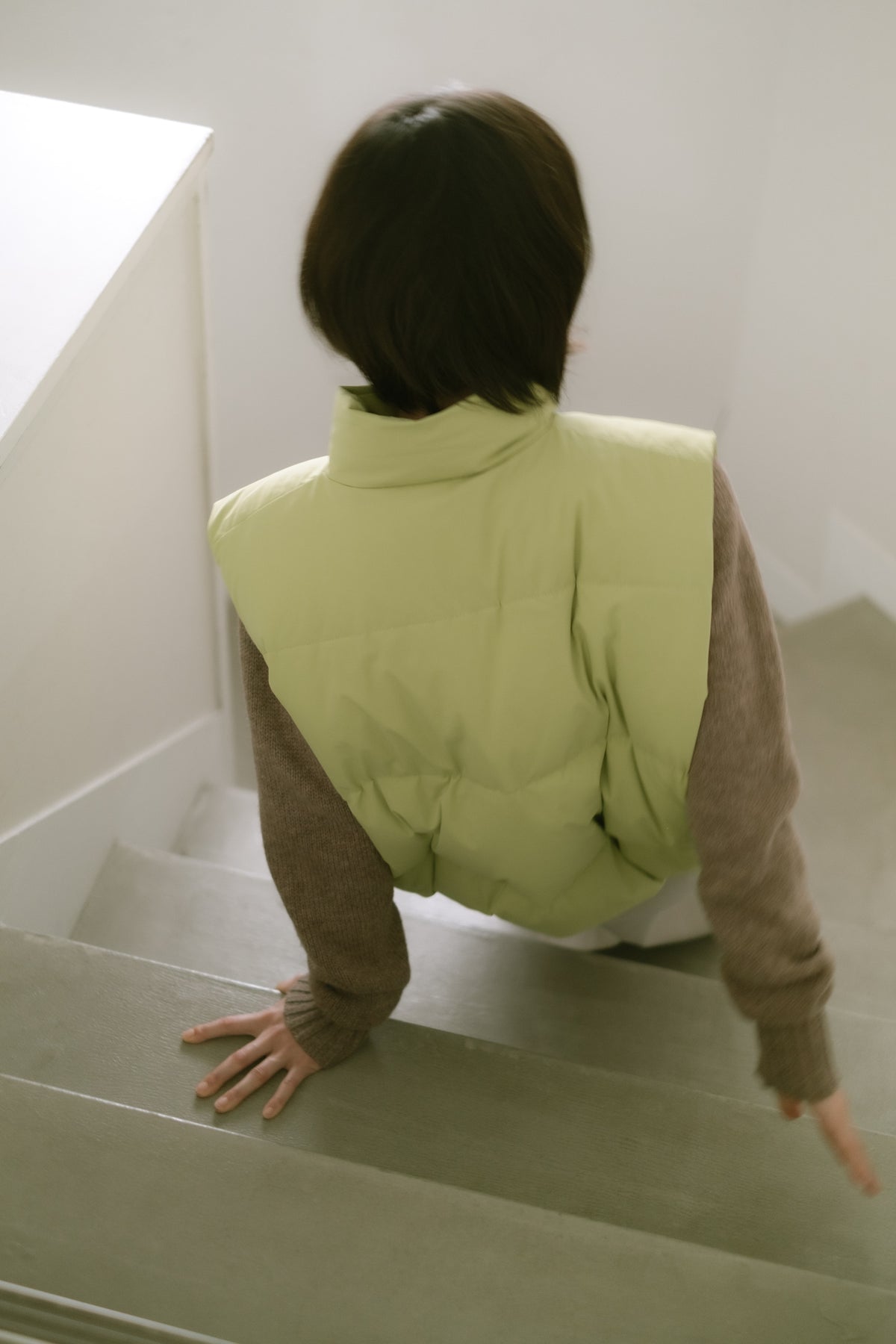down vest / light green
