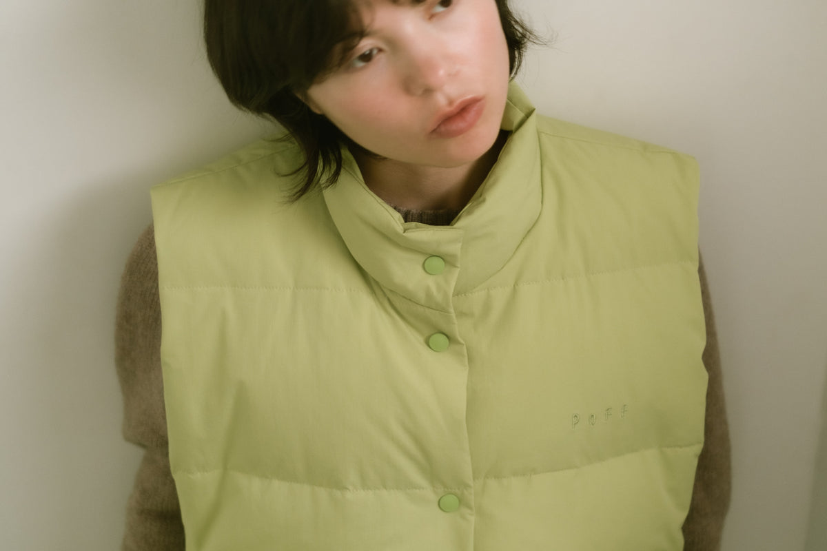 down vest / light green