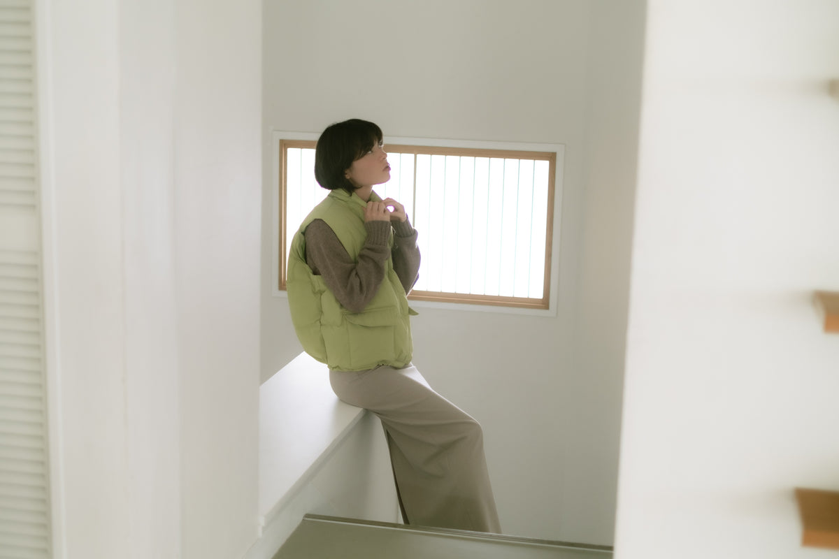 down vest / light green