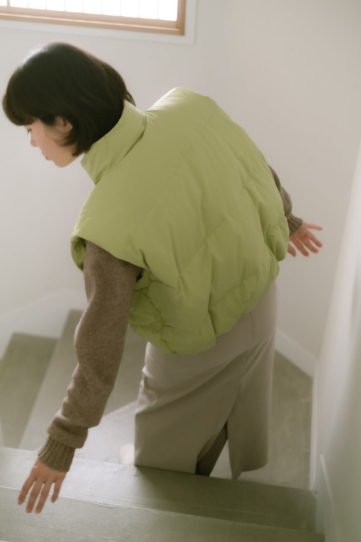 down vest / light green