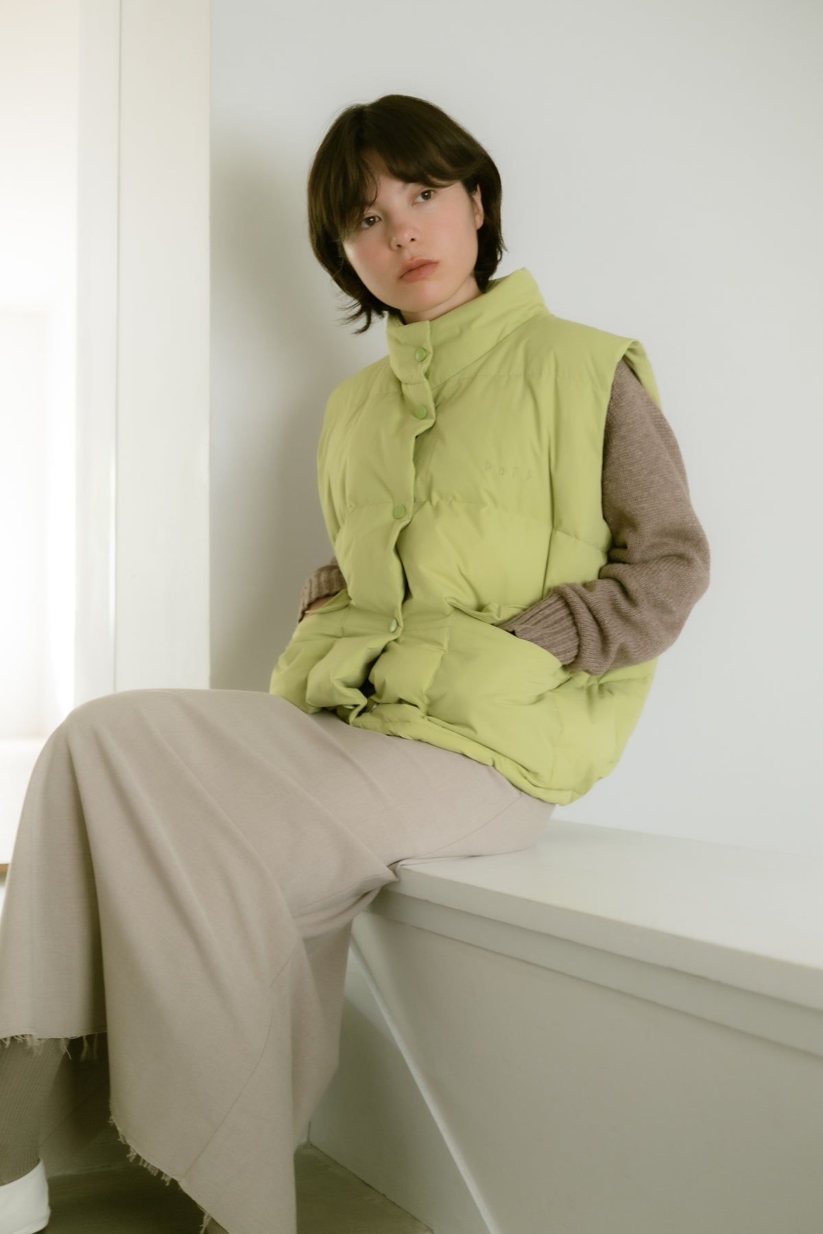 down vest / light green